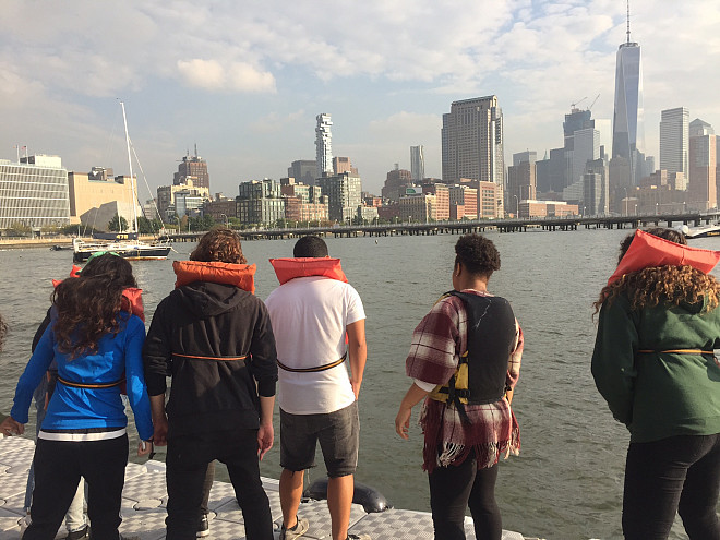 NYC 103 freshmen test water quality at the River Project at Pier 40 on the Hudson River.