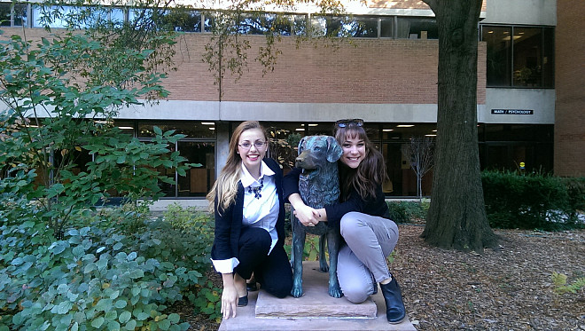 Marisa (left) and Katie (right) pose with the UMBC mascot.