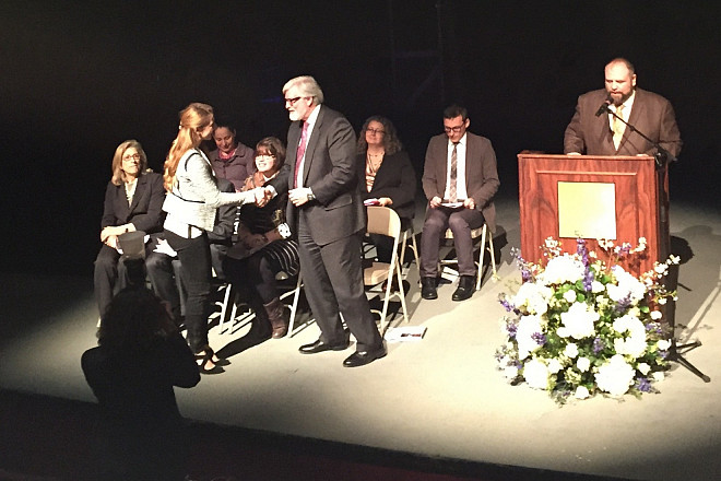 Marisa Dunigan receives the Student-Faculty Collaboration award during the Honors Day ceremony for her work with Prof. Leri.