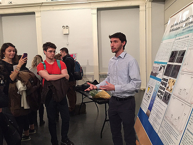 Austin Gellis delivers his Honors Day poster presentation on Analysis of Arabian Sea Deep-Water Sediment Trap Particulates via Microscopy...