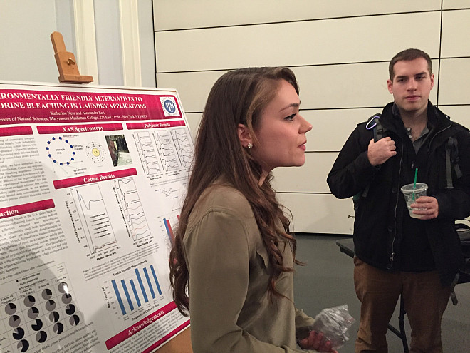 Katie Ness delivers her poster presentation on Environmentally Friendly Alternatives to Chlorine Bleaching in Laundry Applications.