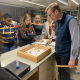 Professor Lundquist showing examples of pinned insects for NYC103: New York City Urban Ecosystem