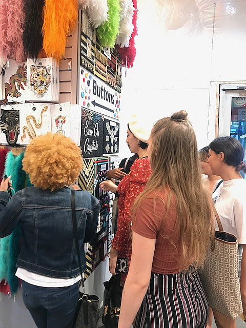 Students in Dr. Kim's Business of Fashion class toured Mood Fabrics and M&J Trimming, and took the opportunity to source materia...