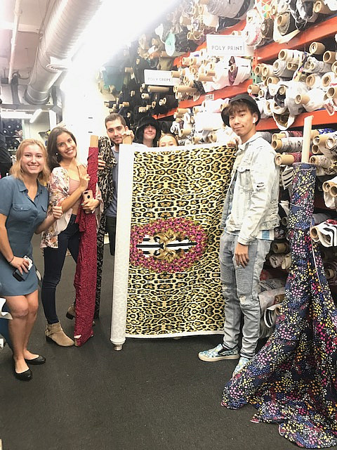 Students in Dr. Kim's Business of Fashion class toured Mood Fabrics and M&J Trimming, and took the opportunity to source materia...