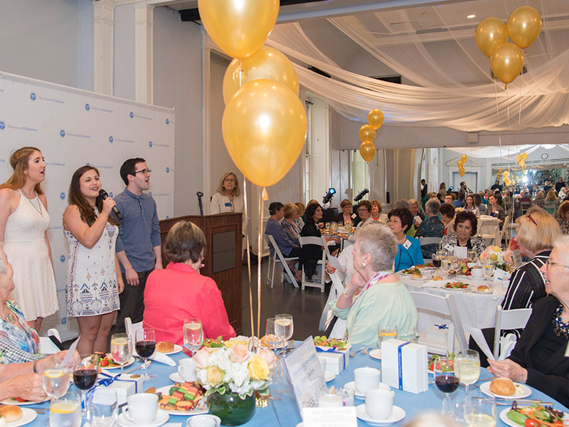 Students performing for alumni at Reunion Weekend