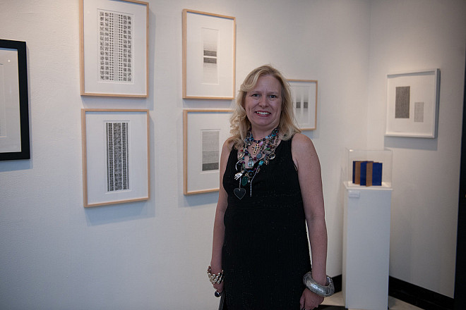 Artist Susan Happersett with her work
