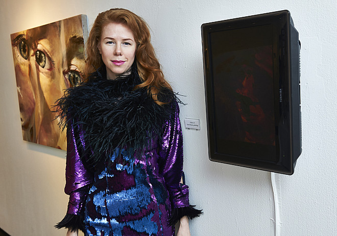 Artist Gerri Davis with her work