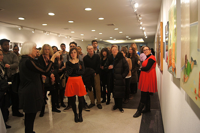 Artist Robin Tewes discussing her work in the gallery