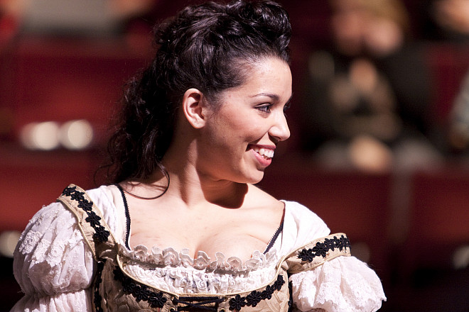 SHE STOOPS TO CONQUER